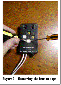 Text Box:  
Figure 1 - Removing the button caps

