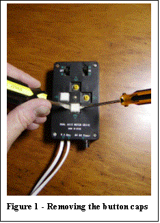 Text Box:  
Figure 1 - Removing the button caps

